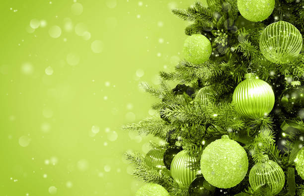 istock Christmas tree ornaments baubles lights. Monochrome green background 1359415599
