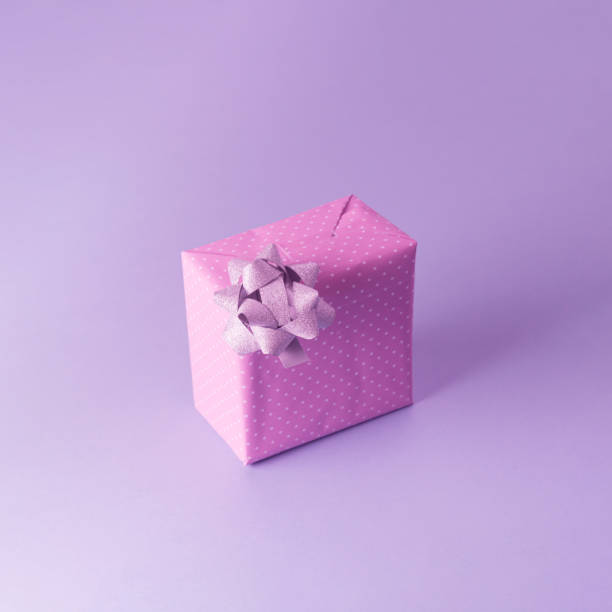 A gift with a bow in a purple atmosphere
