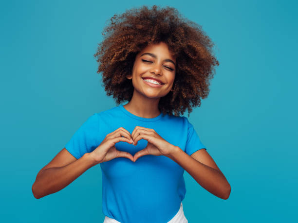 istock Beautiful afro woman 1359417676