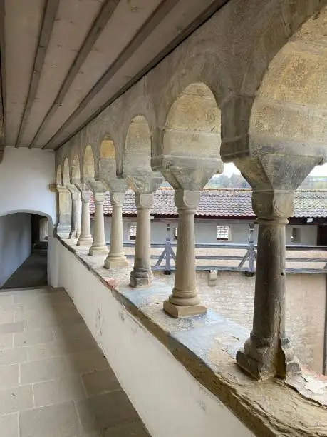A cloister in the monastery at the height of the city wall.