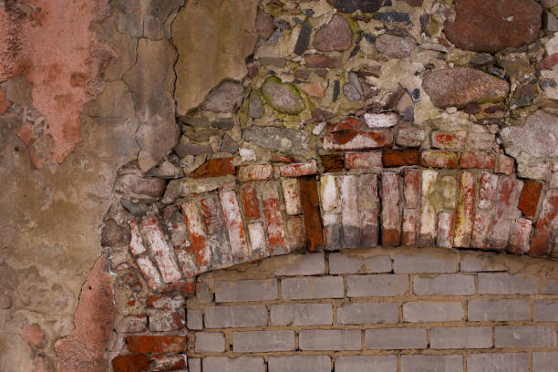 istock Old aged yellow orange red brick wall background texture. 1359418614