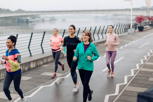 istock Group of female runners training outdoors 1359424362