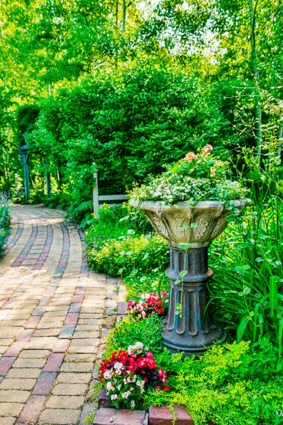 istock Brick walkway in the garden 1359427590