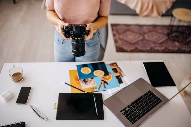 istock Unrecognisable photographer working from home office setup 1359432915
