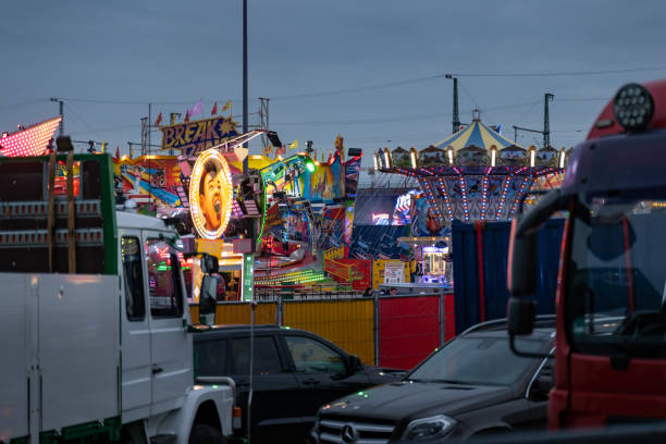 A hundred-year-old fairground galloper roundabout at a fair.