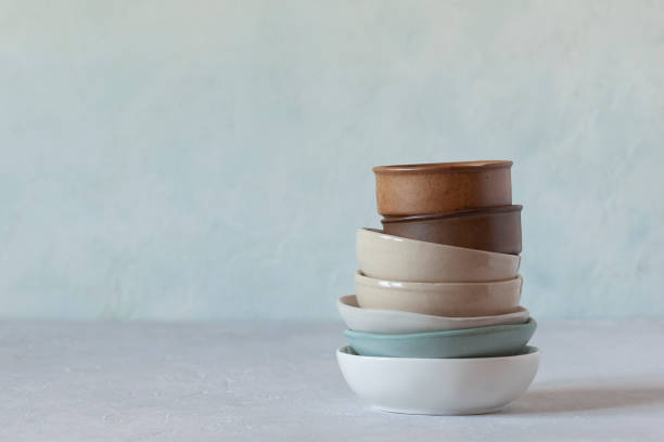 istock Ceramic and sandstone bowls of natural colors 1359435209