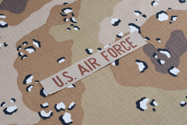 istock AIR FORCE branch tape on desert camouflage uniform background 1359435256