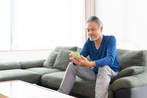 istock elderly man who uses smart phone, 1359435309