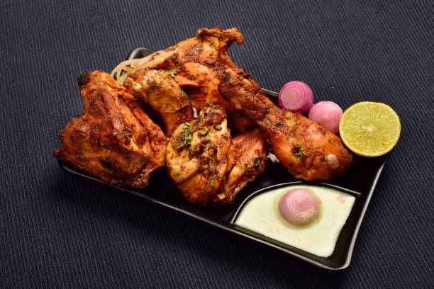 istock Tandoori Chicken with chutney Onion in Plate 1359435521