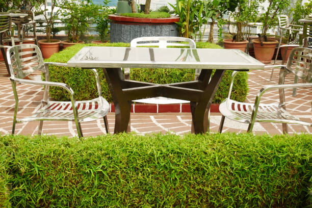 istock many empty chair at cafe in a park 1359437237