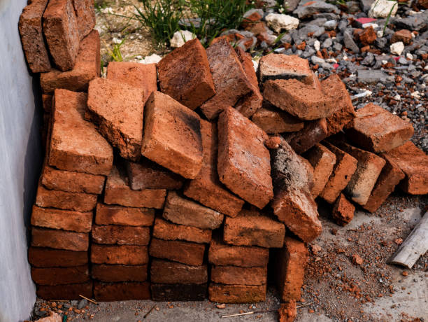 istock pile of red bricks left over from building materials 1359453191