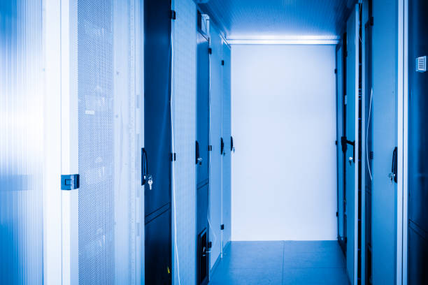 istock Server room with a row of server racks 1359463133