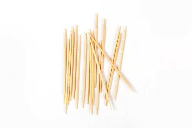 istock Wooden toothpicks isolated on white background 1359473113