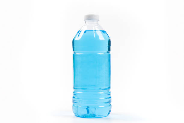 istock bottle of blue windshield washer  fluid isolated on white backgrond 1359474562