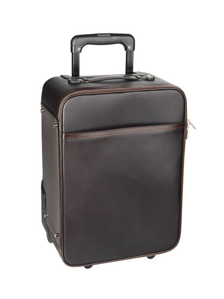 istock Dark brown travel suitcase isolated on white 1359474833