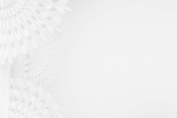 istock Delicate soft light white abstract background with round carved paper fans as side border with copy space on white wall in modern minimal simple asian style. 1359476197