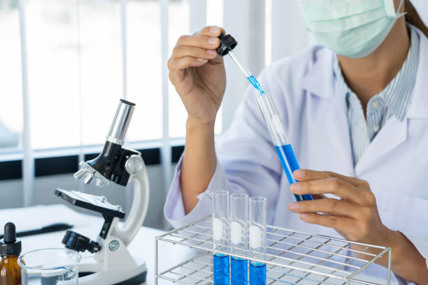 istock Midsection Of Scientist Experimenting At Laboratory 1359477763