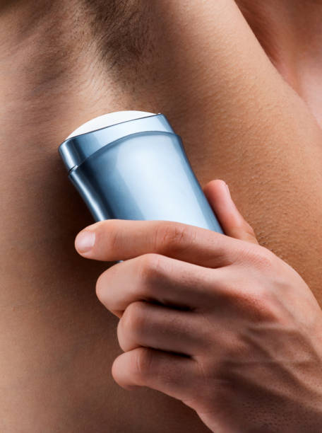 istock Shot of an unrecognizable man applying deodorant 1359481309