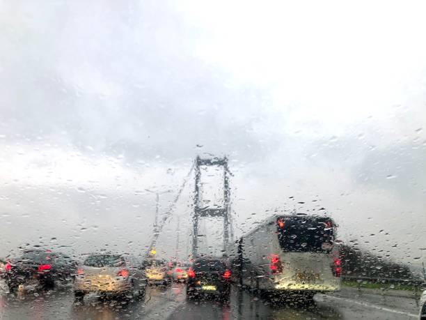 istock traffic in the rain 1359484208