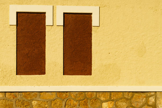 istock Details of yellow facade wall 1359484219