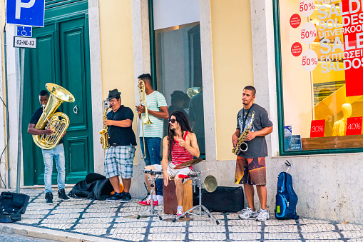 Streets musicians band playong music in the streets of Lisbon, Portugal