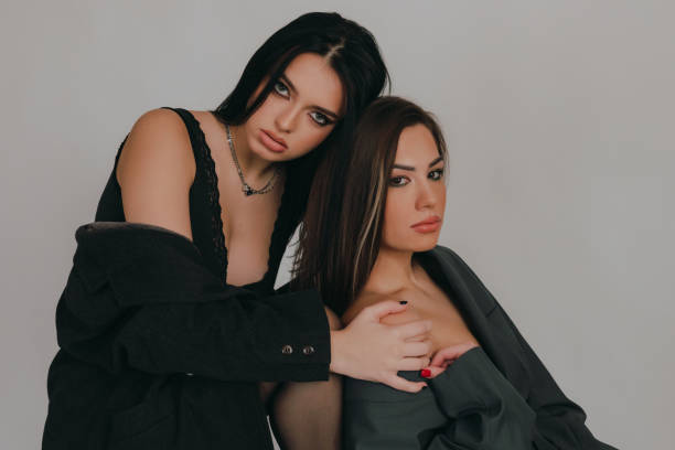 istock Two fashionable young women 1359486436
