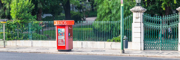 red mail box in the streets of lisbon - lisbon portugal mailbox mail letter imagens e fotografias de stock