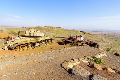 View of old tanks in the Oz 77 battle heritage site (1973 war) and the Valley of Tears (Emek HaBacha) landscape. The Golan Heights, Northern Israel