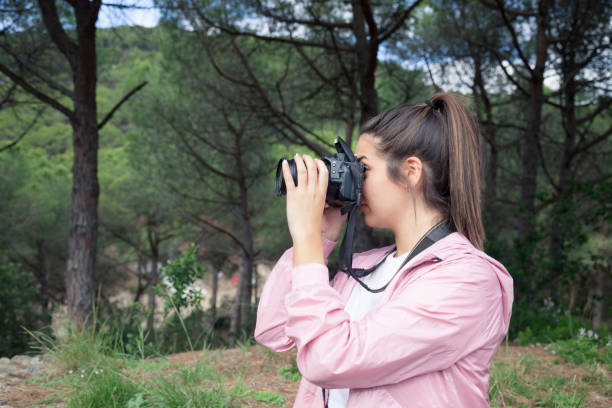 istock Young woman learning to be a photographer 1359490181