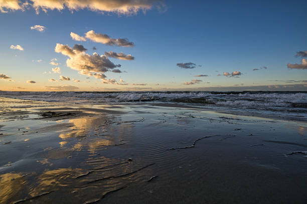 istock sunset on the baltic coast with clouds in the sky 1359492568