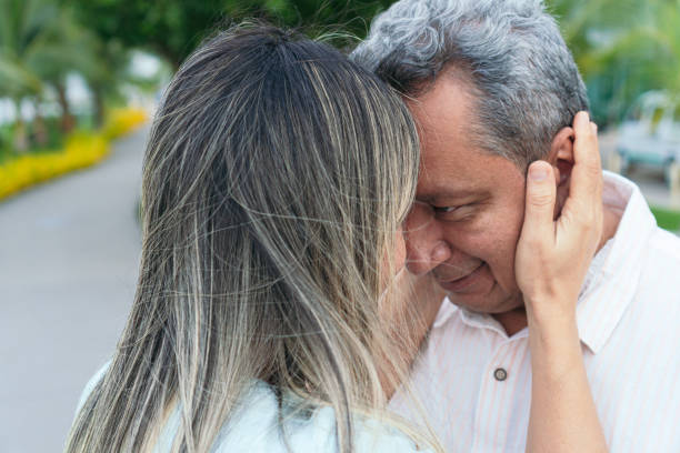 istock Mature couple embracing each other 1359495000
