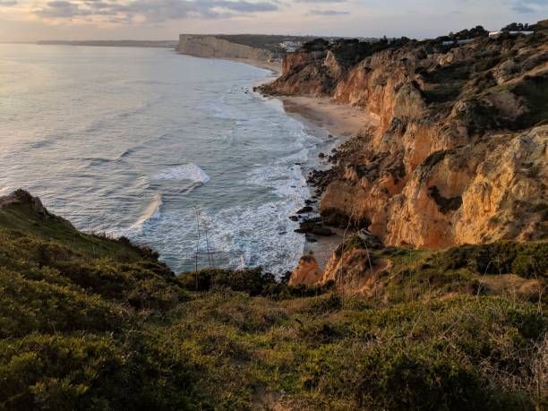 istock Sunset on beach Torre de Aspa in Portugal 1359495601
