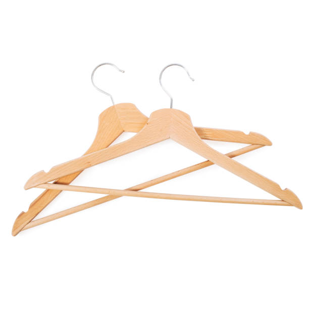 istock Wooden clothes hanger isolated on white background. 1359499048