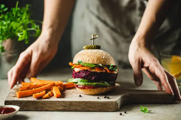 Serving a dish of excellent vegan food and burgers