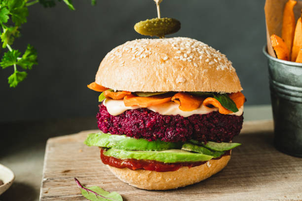 istock Single beet vegan burger still life photo 1359499456