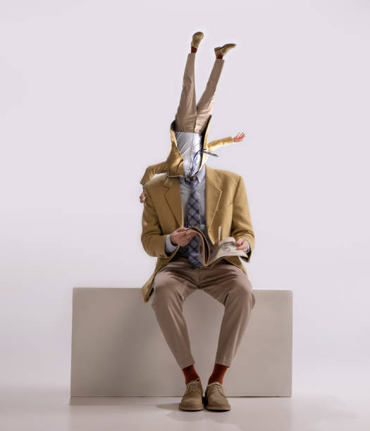 istock Contemporary artwork. Young man, dandy, dude dressed in 50s, 60s style with own body instead head isolated on white background 1359500140