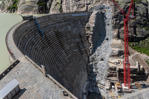 Guttannen, Switzerland - July 23, 2021: New construction of the Dam Spitalllamm at Grimselsee near Guttannen in Valais in Switzerland