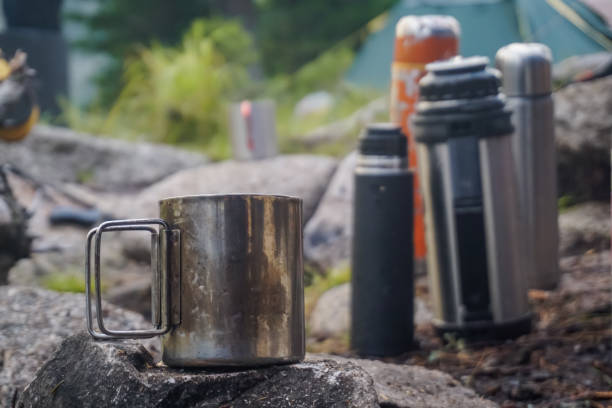 istock Hiking mug and thermos in nature 1359504203