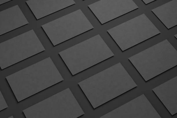 istock Black business card on a black background. 1359504217