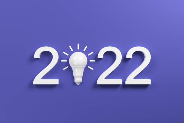 istock 2022 with a white LED lamp on a purple background. 1359504226