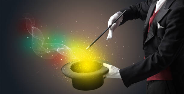 istock Illusionist hand making trick with wand 1359507469