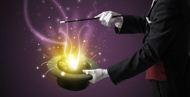 istock Magician hand conjure miracle from cylinder 1359507508