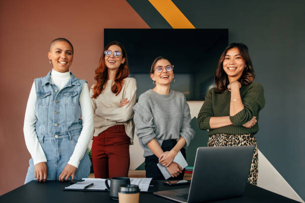 istock Successful female entrepreneurs smiling in a boardroom 1359507558