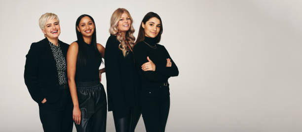 istock Diverse group of women smiling in a studio 1359508784