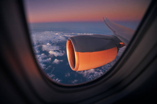 istock View from window of airplane during flight above ocean 1359509506