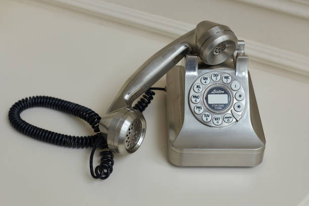 istock old metal disc phone with the handset removed 1359515458
