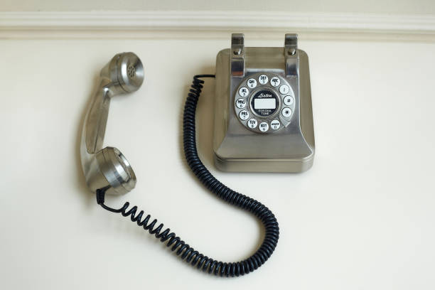 istock old metal disc phone with the handset removed 1359515462