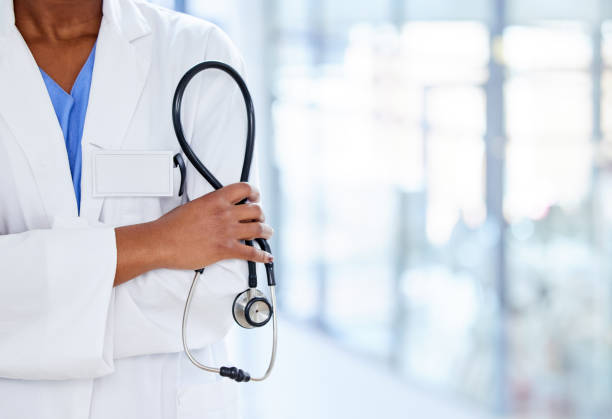 istock Shot of an unrecognizable doctor holding a stethoscope at work 1359518706