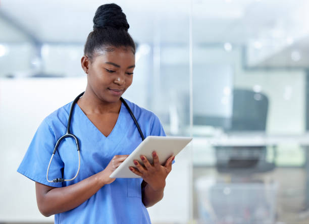 istock Shot of a young female doctor using a digital tablet at work 1359518716