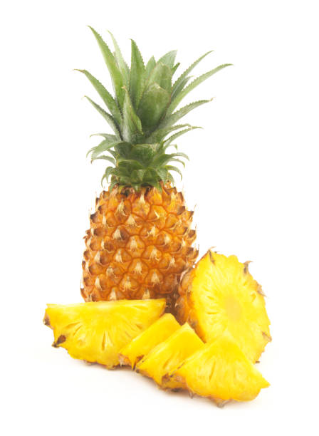 istock Fresh ripe pineapple fruit and pineapple fruit slices isolated 1359519622